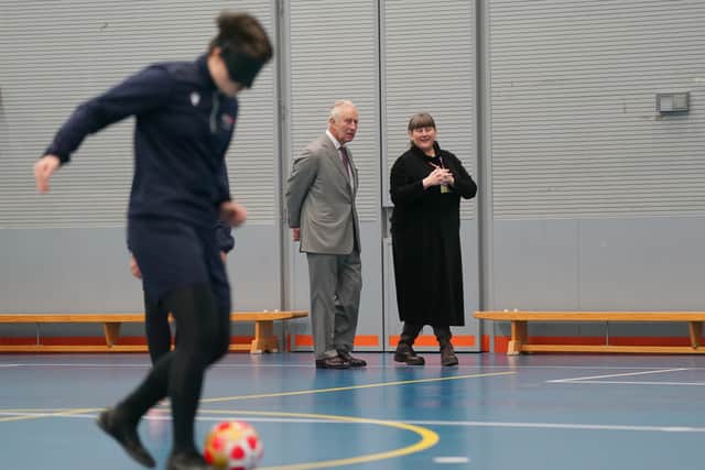 He watched as staff and students played football using a ball that made a noise as it rolled, with instructions shouted out to a defender to help them close down the attacker taking shots at goal.