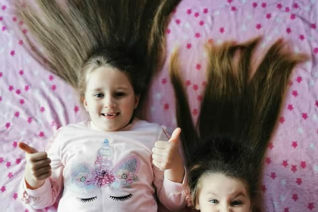 “It’s to give it away to charity. I’ve done it two years ago, and this is my little sister’s first time,” Laura explained.