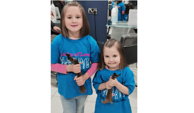 Laura and Zoe Hammersley cut their hair in a bid to raise money for Locks of Love