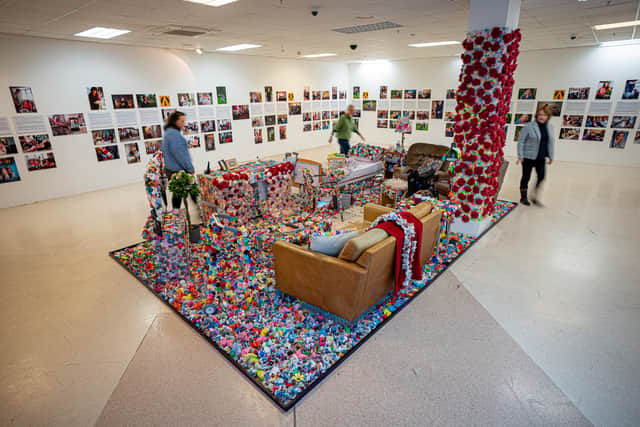 She made around 15,000 of the flowers in the installation, with others crafted by volunteers and groups across the UK.
