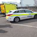 A garda car and ambulance at the scene of this afternoon's incident