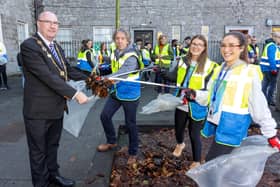 Mayor of Limerick, Cllr Frances Foley, supporting the efforts of Regeneron staff during a clean-up at John's Square
