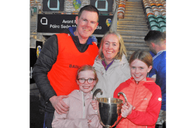 Carrigallen manager Niall Mulleady and his family pictured with the Dick Ellis Cup Picture: Willie Donnellan