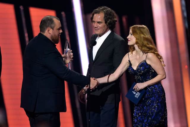 His win came after a performance-packed three-hour show that honoured country icons and new voices.