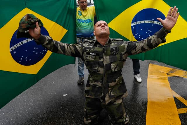 Some chanted, “Armed forces, save Brazil!” and “United, the people will never be defeated!”