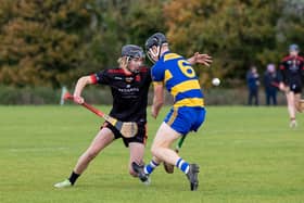 Ardscoil Ris' Diarmuid Stritch attempts to win possession ahead of Cashel's Jack Quinlan in Cappamore | PICTURE:  Kieran Ryan-Benson