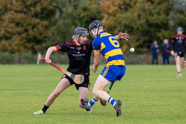 Ardscoil Ris' Diarmuid Stritch attempts to win possession ahead of Cashel's Jack Quinlan in Cappamore | PICTURE: Kieran Ryan-Benson