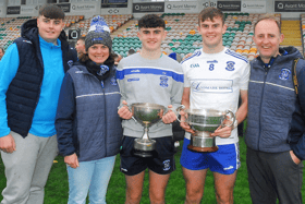 Man of the Match Paul Keaney pictured with his brothers Niall & Brian, mother Orla and father Ivan and the Leitrim Minor and Senior Championship Cups Picture: Willie Donnellan