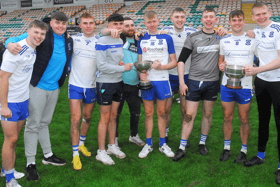 Members of the victorious St Mary's Senior & Minor teams celebrate with the Fenagh and George O'Toole Cups Picture: Willie Donnellan