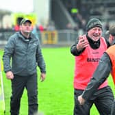 Jubilant Colmcille manager Mickey Harkin celebrating the dramatic win with fellow mentor Paul Treacy at the final whistle Photo: Syl Healy