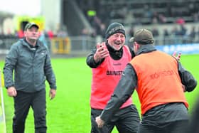 Jubilant Colmcille manager Mickey Harkin celebrating the dramatic win with fellow mentor Paul Treacy at the final whistle Photo: Syl Healy