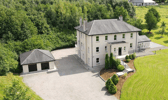 This substantial property features seven bedrooms (five with ensuite facilities) playroom, office and laundry room and detached garage