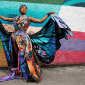 Musician Tolü Makay wearing Dress by Claire Garvey, Head scarf by Jennifer Rothwell and Neck piece by Emer Roberts at the launch of Made Local 2022 from Design & Crafts Council Ireland