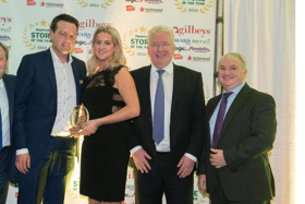 Dean  and Triona Hand, who had to take the heartbreaking decision to close their Clerihan Daybreak store on Sunday, are pictured receiving the Daybreak Store of the Year Award for 2016