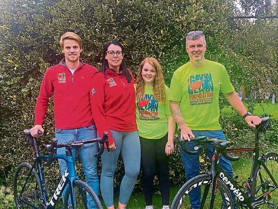 Ellie Cusack pictured with mum Caroline, step-dad Tim and cousin Ross