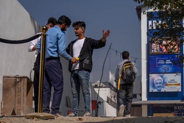 Decades of deadly conflict, bombings and a brutal Indian counter-insurgency campaign have turned people away from cinemas, and only about a dozen viewers lined up for the first morning show, the Bollywood action movie Vikram Vedha.