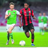 Jordan Adeyemo in action for Longford Town against Cork City opponent Cian Bargary in the recent league game at Turners Cross Photo: Michael P Ryan/Sportsfile