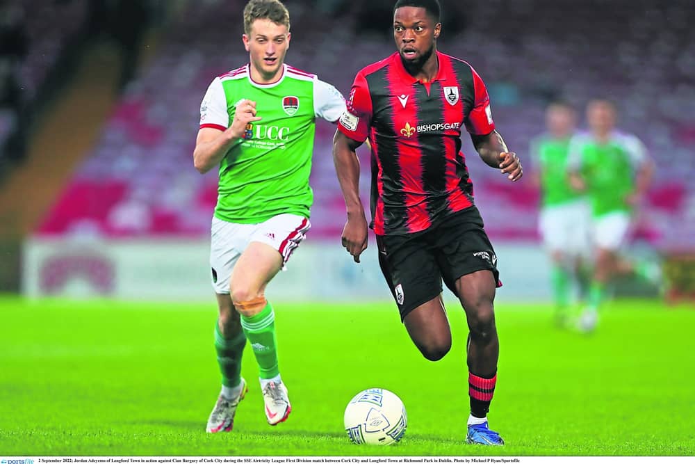 Jordan Adeyemo in action for Longford Town against Cork City opponent Cian Bargary in the recent league game at Turners Cross Photo: Michael P Ryan/Sportsfile