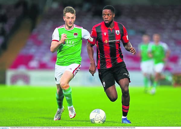 Jordan Adeyemo in action for Longford Town against Cork City opponent Cian Bargary in the recent league game at Turners Cross Photo: Michael P Ryan/Sportsfile
