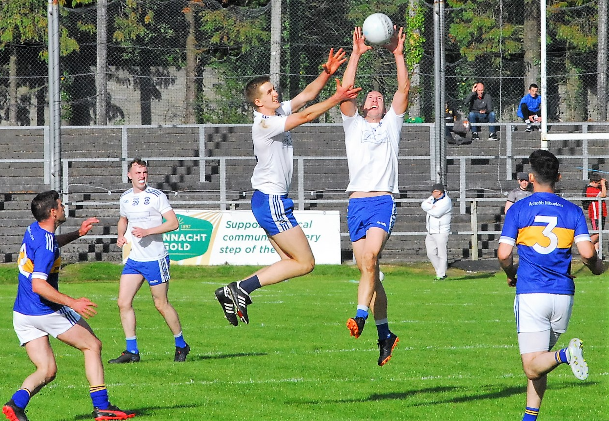 James McGrail fields the ball ahead of his St Mary's teammate David O'Connell Picture: Willie Donnellan