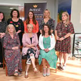 Minister Helen McEntee pictured with staff at Amber Women's Refuge