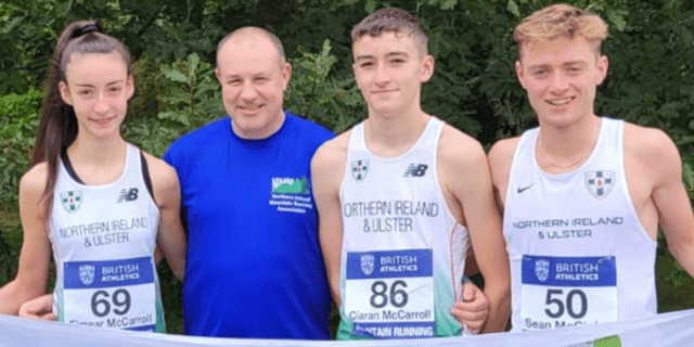 Finn Valley AC athletes Eimear McCarroll, Ciaran McCarroll and Sean McGinley with coach John Rogan.