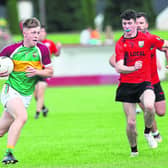 Elliott Vaughan surging forward for Ardagh Moydow with Cashel opponent Jack Sweeney in pursuit. Action from the IFC Round 6 clash at Leo Casey Park Photo: Syl Healy