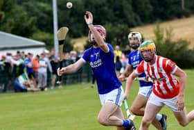Adrian Burke (Thomastown) reaches out for the sliotar as Michael Walsh (Young Irelands) gives chase PICTURE: WILLIE DEMPSEY