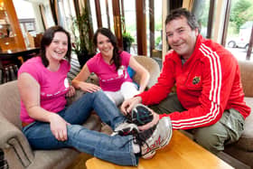 The late, great Anthony Foley with his sisters Orla and Rosie