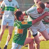Castlemitchell Emmet Hyland is tackled by Kildangan's Daniel Gilbert in the JFC round 4 clash on Thursday in Hawkfield