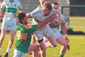 Castlemitchell Emmet Hyland is tackled by Kildangan's Daniel Gilbert in the JFC round 4 clash on Thursday in Hawkfield