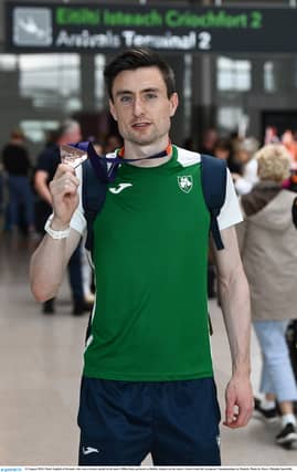 Mark English showing off his European bronze after arriving in Dublin Airport Photo: Harry Murphy/Sportsfile