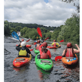 Youth club members kayaking in Graignamanagh