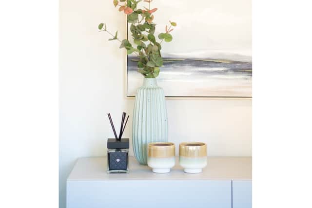 For a cost-effective way to keep the summer vibes going, she says to add ceramics to your existing interior.