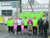 Charlie Magill (third from right) pictured outside JK Brackens GAA grounds
