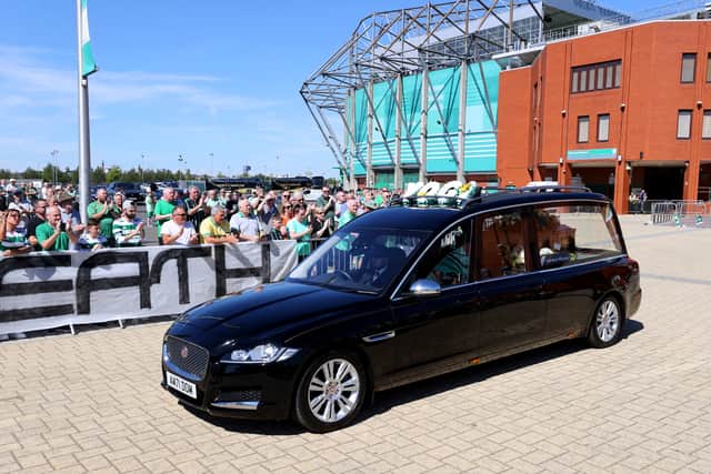The funeral cortege later made the short journey to Celtic Park where supporters paid tribute to Hughes, who died earlier this month at the age of 79 after a short illness.