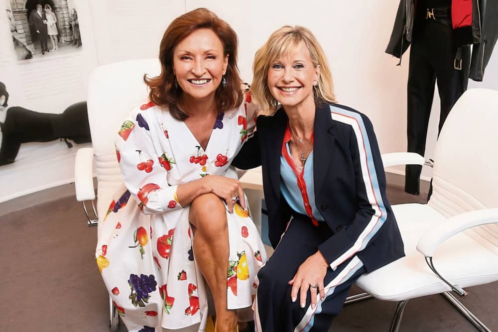 Limerick stylist Celia Holman Lee pictured with the late Olivia Newton John