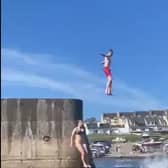 A clip of youngsters diving into the sea off Kilkee Bay has gone viral on social media