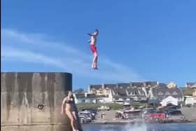 A clip of youngsters diving into the sea off Kilkee Bay has gone viral on social media