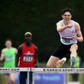 Fintan Dewhirst in action last month at the 400m hurdles at the Ulster underage championships at the Antrim Forum