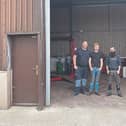 Rory Browne, Paul Dollery and Sean Connaughton in their new garage
