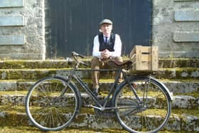 Marty Guinan relaxing on the steps of what was the former Shannon Harbour Hotel building during the recent High Nelly Cycle.