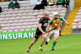 Sean Curran, with Toomevara's Kevin McCarthy keeping tabs on him, goes on the attack for Mullinahone in the opening round of the FBD Insurance county senior hurling championship in Thurles.