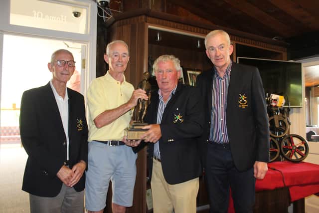 Pictured: Johnny Flaherty describing his hole in one at the prize giving ceremony in Esker Hills.