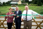 Cllr John Egan pictured cutting the ribbon of the new Community Wildlife Area in Kilteely with John McCarthy and Marie Chavan of Kilteely Tidy Towns | PICTURES: Don Moloney