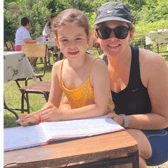 Enjoying tea and refreshments at Glengarra Mountain Lodge  in beautiful sunshine on Sunday, July 17 were  Kaitlyn and Emma Russell
