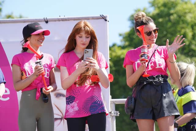 Roberts, 36, Coyle, 37, and Cheryl donned pink T-shirts with Race for Life wording as they ran together in Hyde Park, while Walsh, 40, took part remotely as she was not able to join them in London.