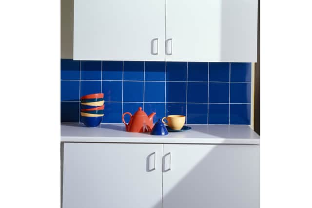 If you decide replacing your kitchen is way out of your budget, Grossman says creating a feature wall, or even a feature backsplash, can add some wow factor to a tired kitchen.
