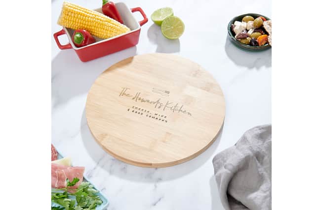11. Personalised Wooden Family Cheeseboard, £26, Sunday’s Daughter