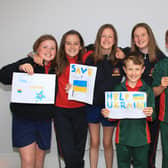 Caoimhe Hartney, Kate Cronin, Rachel Maher, Caoimhe O'Farrell, Harry O'Sullivan, James Maher and Louise O'Sullivan (missing from photo Madison Rountree) with their Bracelets | PICTURES: Adrian Butler